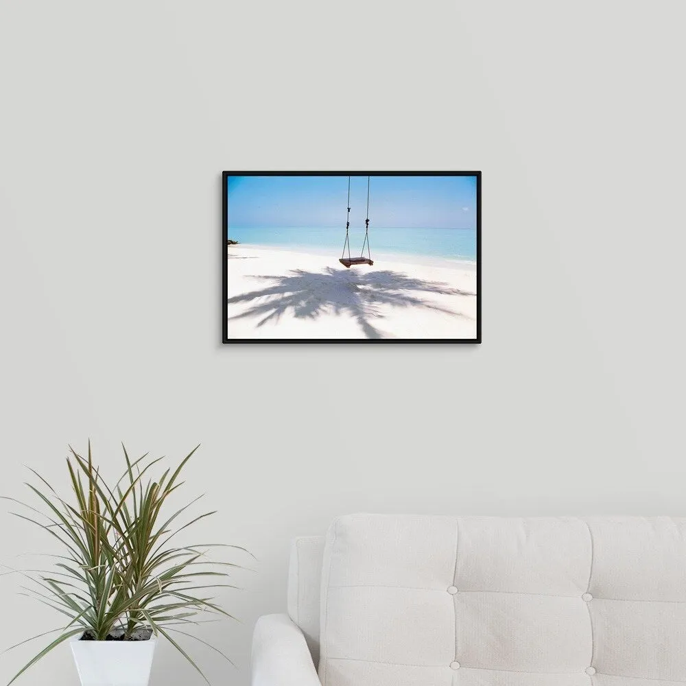 "Beach swing and shadow of palm tree on sand" Black Float Frame Canvas Art