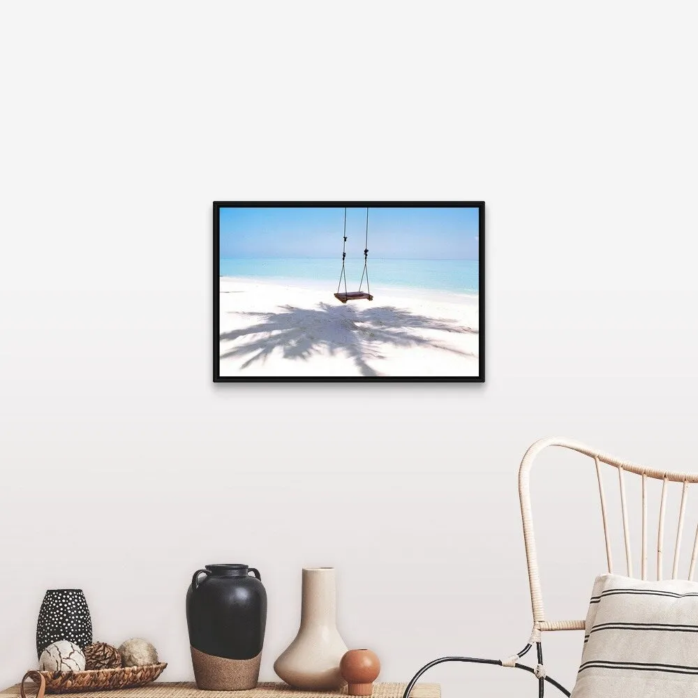 "Beach swing and shadow of palm tree on sand" Black Float Frame Canvas Art