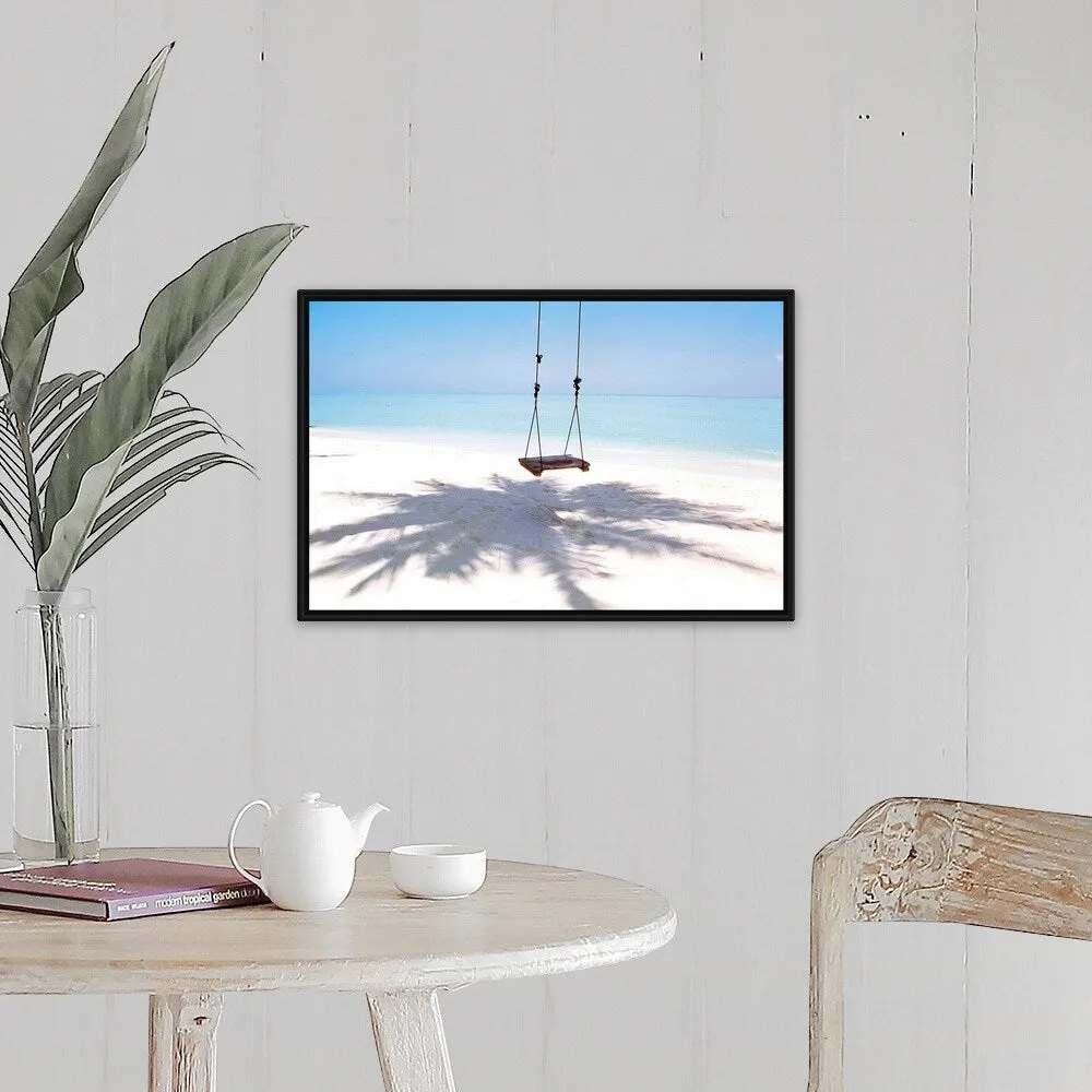 "Beach swing and shadow of palm tree on sand" Black Float Frame Canvas Art