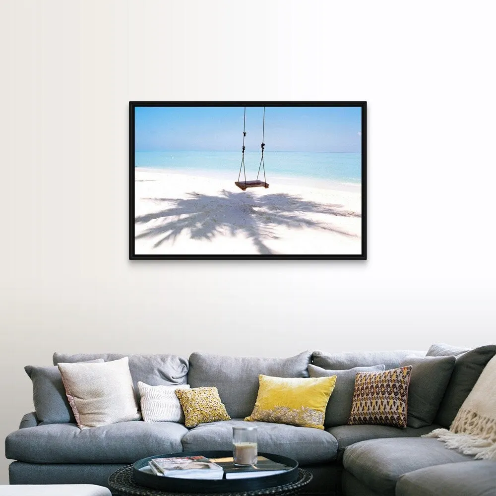 "Beach swing and shadow of palm tree on sand" Black Float Frame Canvas Art